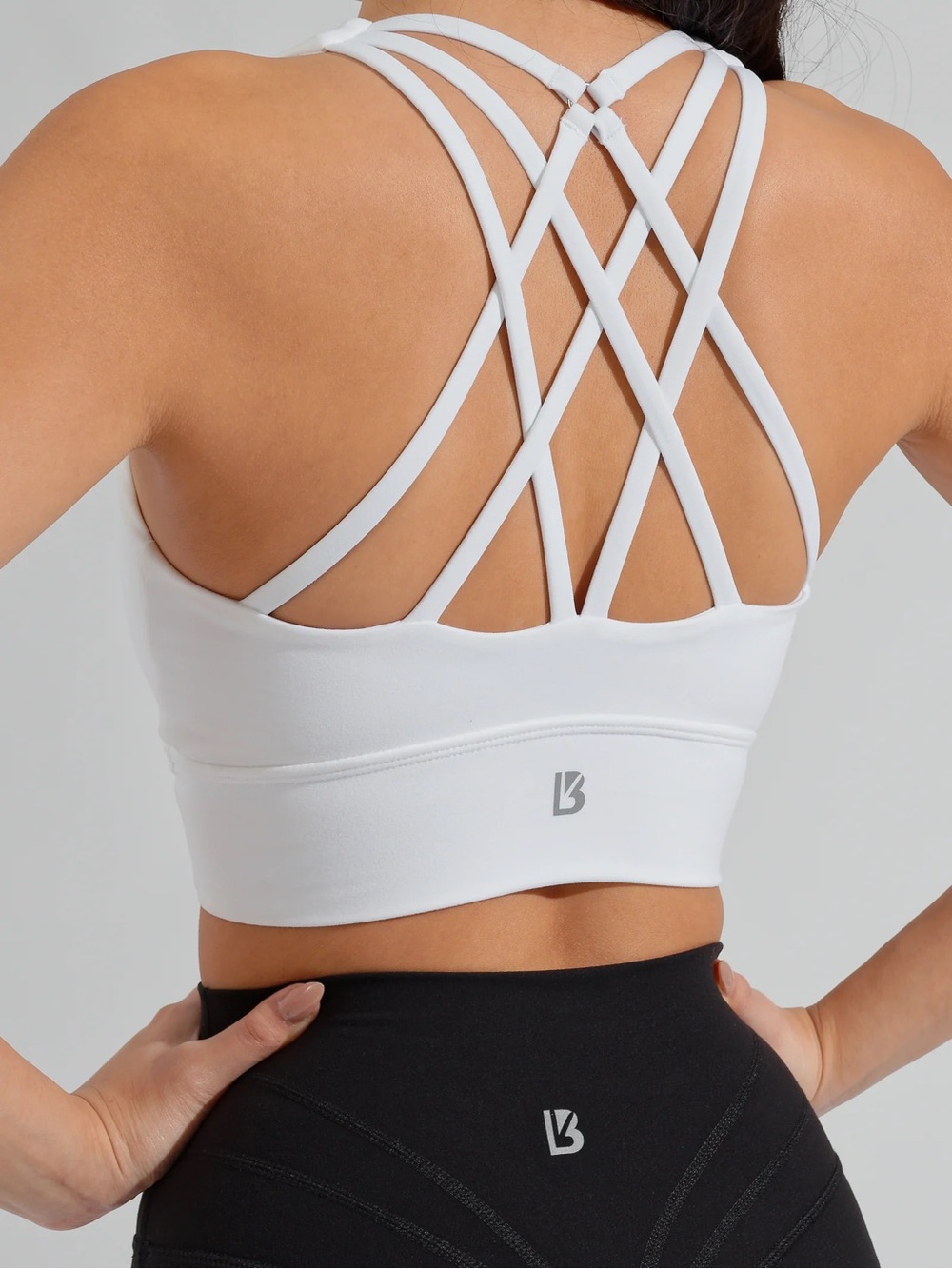 Buffbunny Collection revolution sports bra strappy top workout criss cross